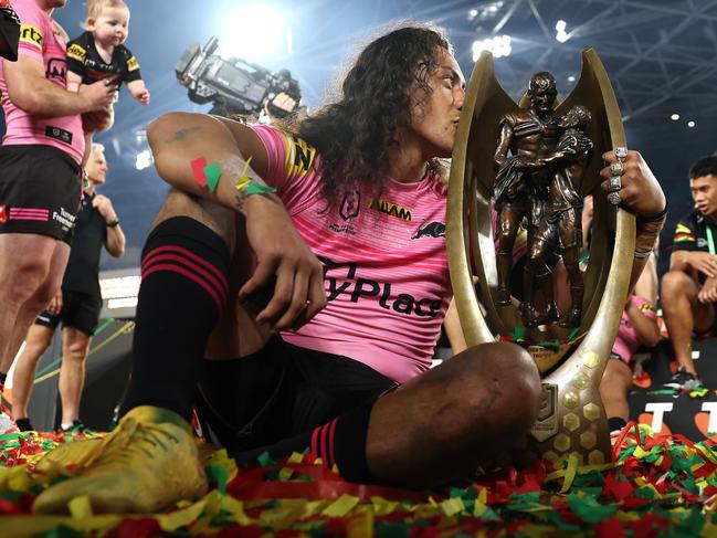 SYDNEY, AUSTRALIA - OCTOBER 06:  Jarome Luai of the Panthers poses with the Provan-Summons Trophy after winning the 2024 NRL Grand Final match between the Melbourne Storm and the Penrith Panthers at Accor Stadium on October 06, 2024, in Sydney, Australia. (Photo by Cameron Spencer/Getty Images)