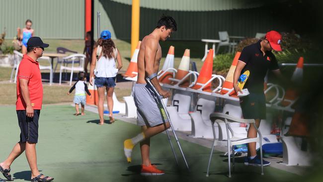 China's Olympic champion Sun Yang limps to the pool at Banora on crutches. Picture: Craig Greenhill