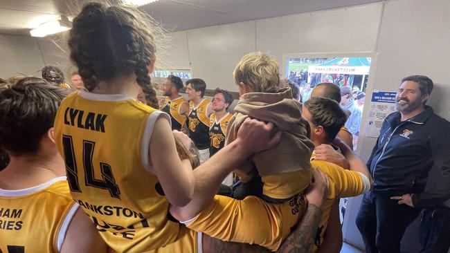 Frankston YCW players and supporters — of all ages — celebrate Saturday’s win. Picture: Valeriu Campan