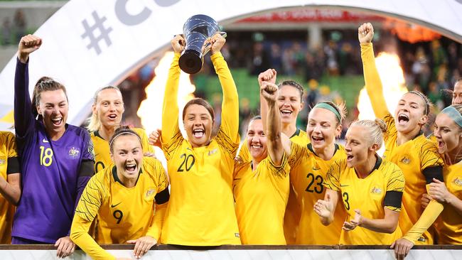 Captain Sam Kerr lifts the trophy aloft after the Matildas won the Cup of Nations last month. Picture: Getty Images  