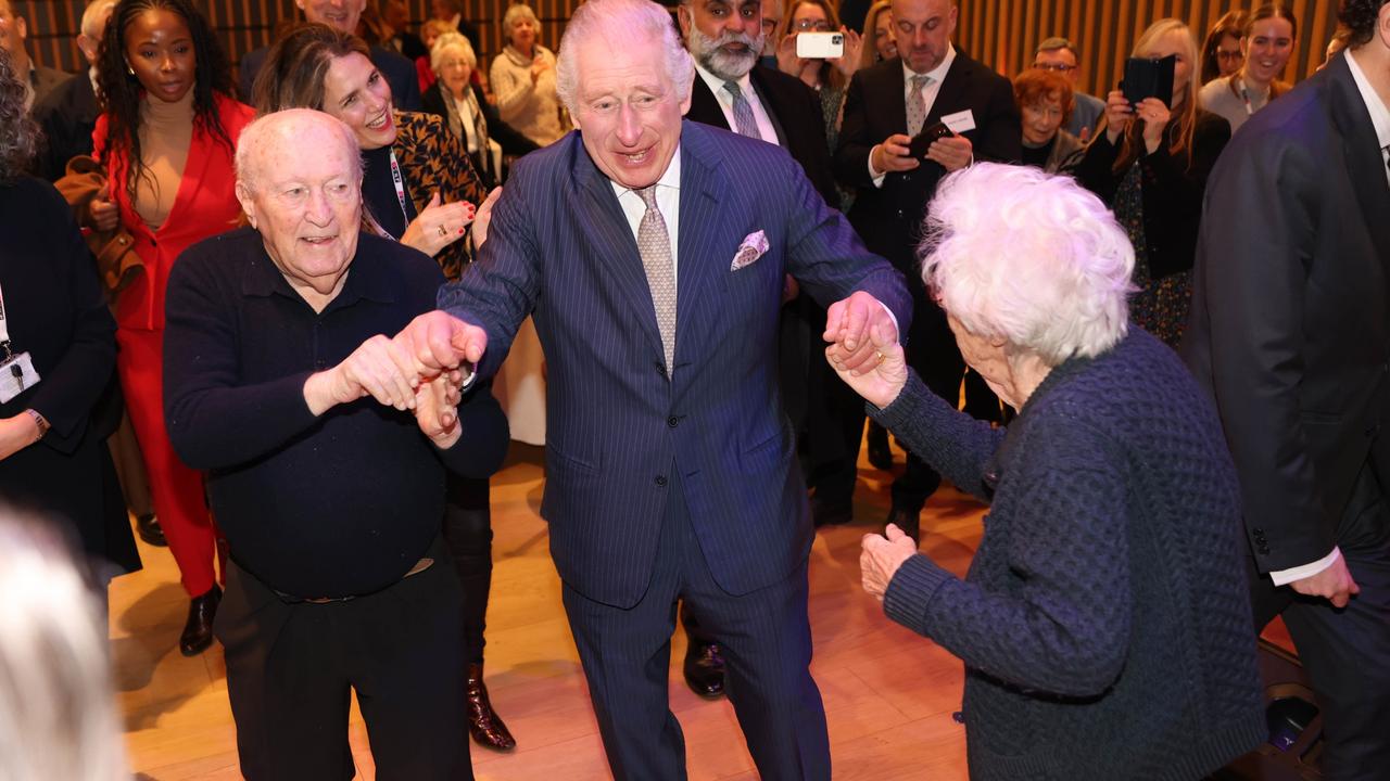 King Charles III dances at a reception for Holocaust survivors in London. Picture: Ian Vogler – WPA Pool/Getty Images