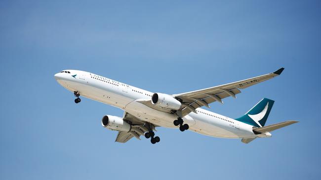 A Cathay Pacific jet plane from Hong Kong comes in to land at the Cairns International Airport, carrying a load of Chinese tourists to visit Far North Queensland. Picture: Brendan Radke