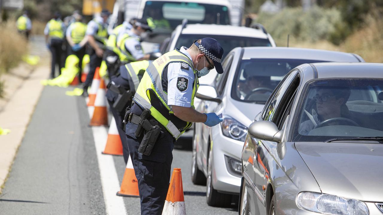 ACT Police check cars at a checkpoint point on the Federal Highway, coming into Canberra from NSW. Picture: NCA NewsWire / Gary Ramage