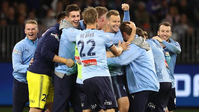 Sydney FC celebrate their big A-League final success.