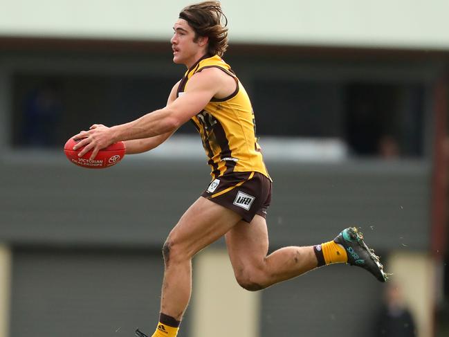 Jai Newcombe on the run for Box Hill Hawks.