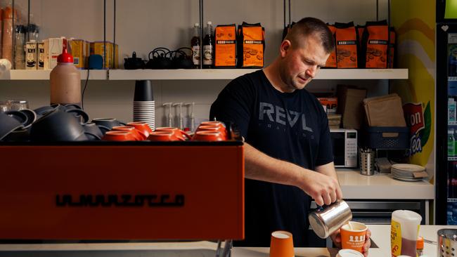 Mitchell Leach at his Four Brothers Espresso cafe at Westfield Warringah Mall in Brookvale.