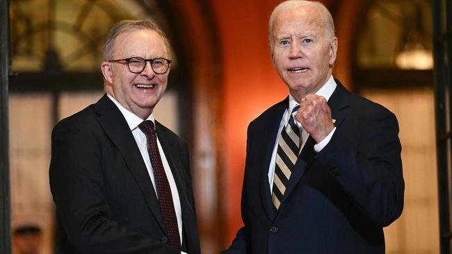 US President Joe Biden bids farewell to Australian Prime Minister Anthony Albanese at the end of the Quadrilateral Summit at the Archmere Academy in Wilmington, Delaware, on September 21, 2024. (Photo by Brendan SMIALOWSKI / AFP)