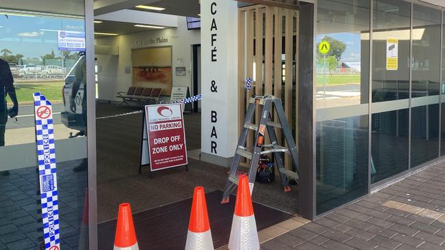 The scene after two cars hit the Dubbo Airport doors on Tuesday morning.