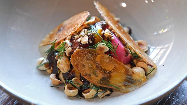 Baby beets, hazelnut, hummus, black garlic, kipfler crisp at Lou's Place at Rowland Flat. Picture: Tom Huntley