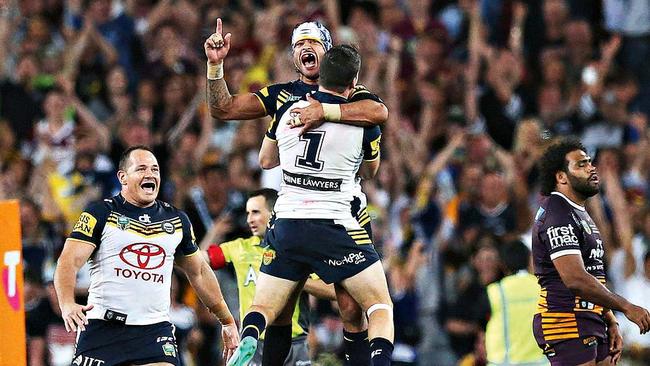 Johnathan Thurston celebrates winning the 2015 NRL Grand final. Picture. Phil Hillyard