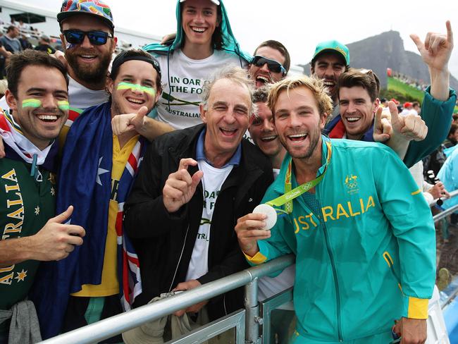 Australia's Joshua Booth celebrates after winning the silver medal with Joshua Dunkley-Smith, William Lockwood and Alexander Hill in the Men's Four final at Lagoa Stadium at the Rio 2016 Olympic Games. Picture: Brett Costello