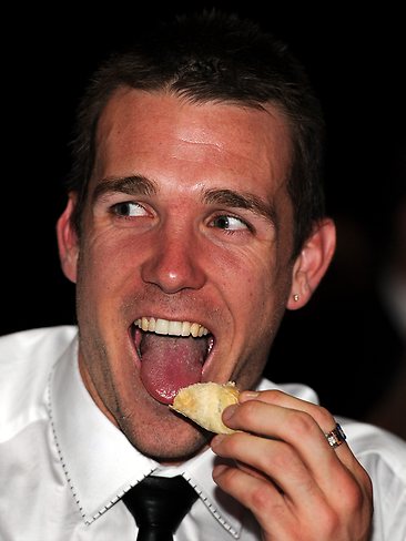 Collingwood's Dane Swan has a bite to eat at the Brownlow Medal count. Picture: Michael Dodge