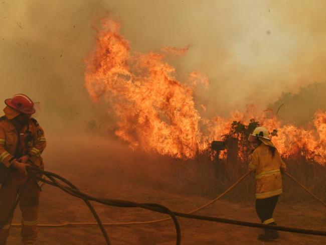 Firefighters have been battling an “unprecedented” number of emergency level fires on multiple fronts. Picture: Sam Mooy/Getty Images