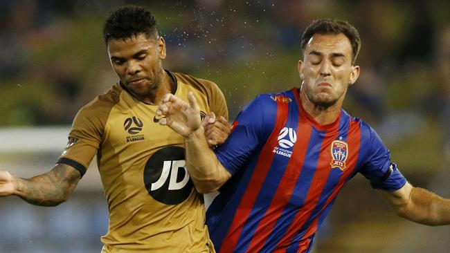 The Wanderers’ Kwame Yeboah (left) and the Jets’ Ben Kantarovski in action on Saturday night. Picture: AAP