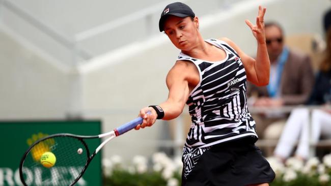 Ash Barty hits a return to Marketa Vondrousova