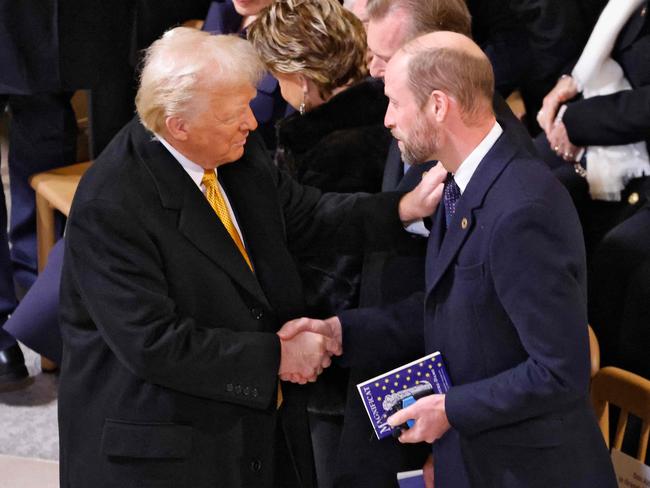 US President-elect Donald Trump (L) shakes hands with Britain’s Prince William inside Notre-Dame ahead of a ceremony to mark the reopening of the landmark cathedral. Picture: AFP