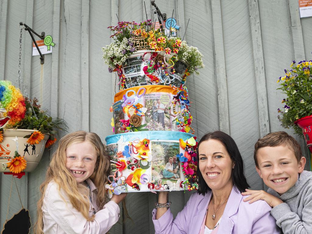 Amy McGaw with her kids Matilda and Henry McGaw of Toowoomba East State School as the school win the P-12 school category. Picture: Kevin Farmer