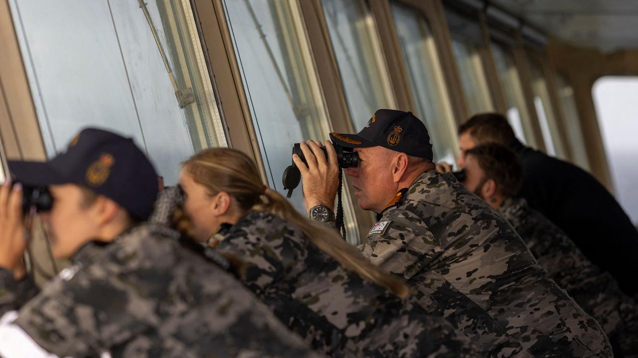 Royal Australian Navy ship HMAS Choules Commander Arron Convery looking with crew members for Lithuanian long-distance rower Aurimas Mockus in the Coral Sea. Picture: Royal Australian Navy