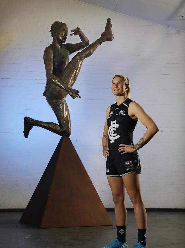 Tayla Harris and the life-size statue set to go on display tomorrow, commissioned by NAB. Picture: Alex Coppel.