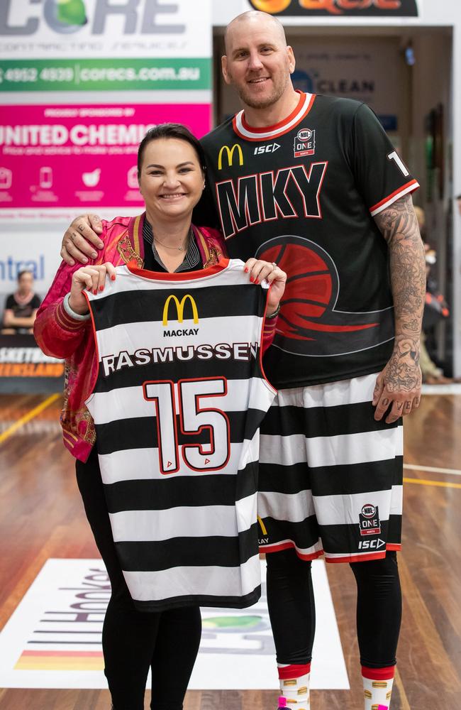 Niki Ramsay (left) won the auction for Bradley Rasmussen's match-worn jersey after Mackay Meteors defeated Cairns in the NBL1 North. Picture: Contributed