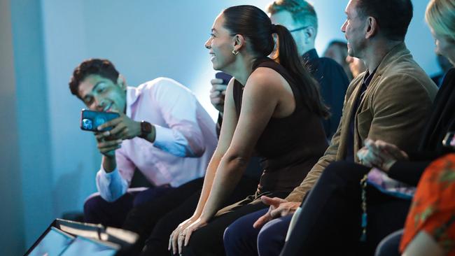 The Australian’s Liam Mendes takes a snap of legal affairs correspondent Ellie Dudley as she is announced as Young Journalist of the Year at the 2024 News Awards. Picture: Christian Gilles