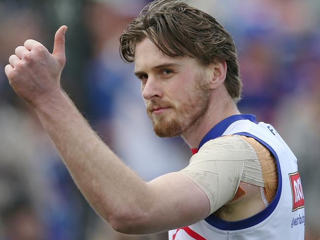 Jordan Roughead gives fans the thumbs up at training. Picture: Michael Klein