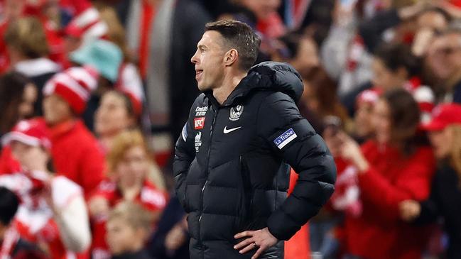 SYDNEY, AUSTRALIA - AUGUST 09: Craig McRae, Senior Coach of the Magpies looks dejected after a loss during the 2024 AFL Round 22 match between the Sydney Swans and the Collingwood Magpies at The Sydney Cricket Ground on August 09, 2024 in Sydney, Australia. (Photo by Michael Willson/AFL Photos via Getty Images)