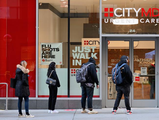 People stand in line as they wait to take coronavirus tests in New York City. Picture: AFP