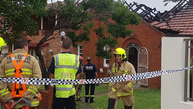 More than 20 firefighters on scene at house fire in Myrna Rd. Picture: Damian Shaw 