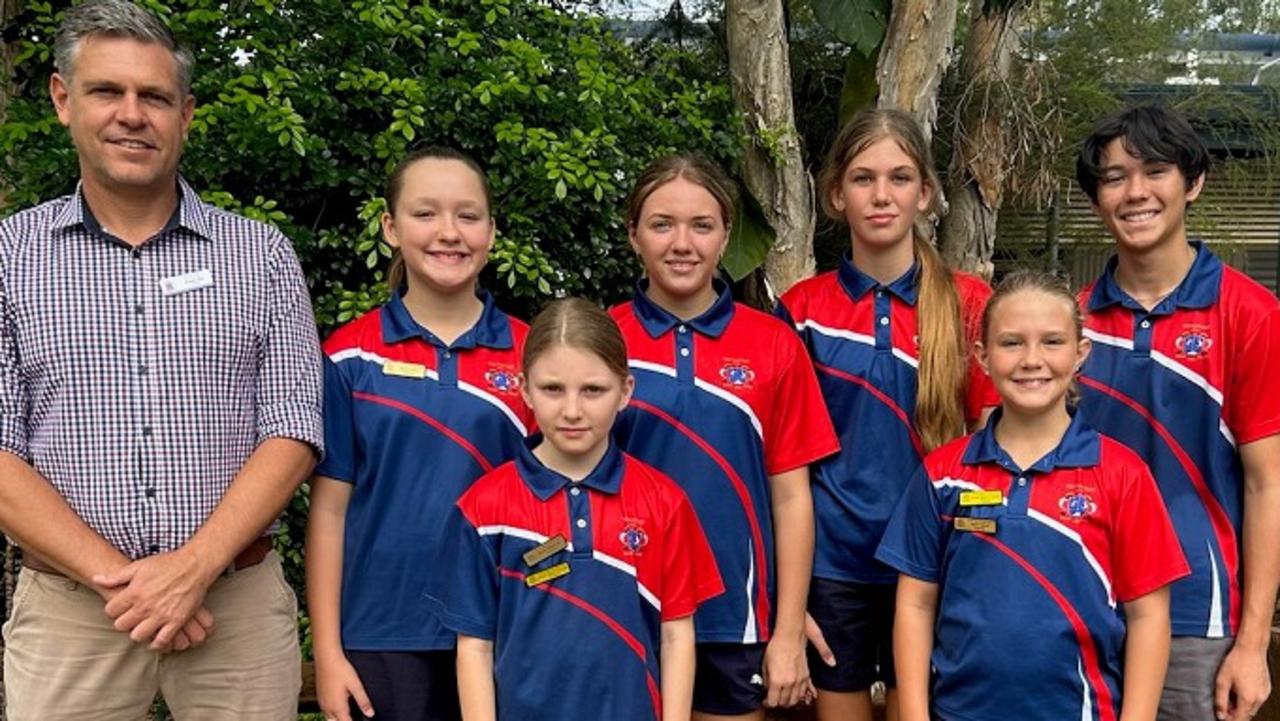 Tin Can Bay State School 2023 school leaders. Back: Principal Daman Weir, Amanda Geurts, Sienna Arthur, Rylei Braddock, Brandon Roby. Front: Madison Katon, Kaylee Jensen. Absent: Harmonie Milesi