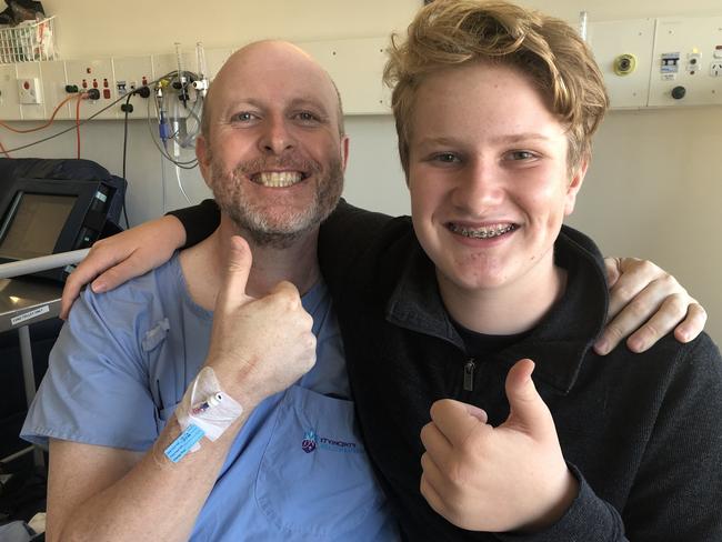 Jayden Cummins with his son Henry 10 minutes before he received his heart transplant.