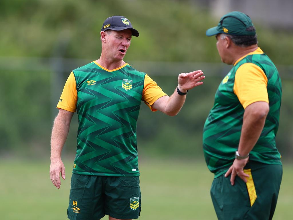 Justin Holbrook talks with Mal Meninga during Kangaroos camp. Picture: Chris Hyde/Getty Images