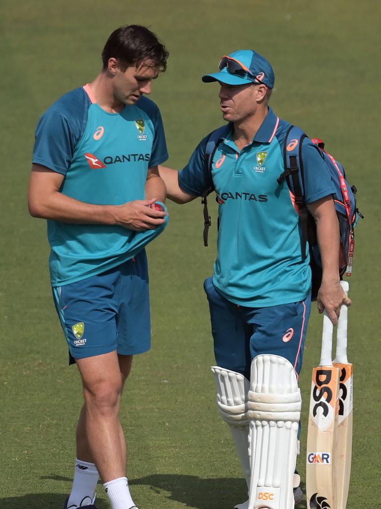 Australia's captain Pat Cummins (L) and his teammate David Warner.