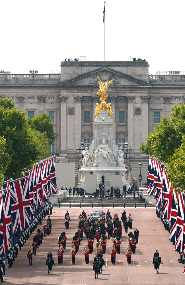 The coffin of Queen Elizabeth II, is pulled by a Gun Carriage of The King's Troop Royal Horse Artillery, during a procession from Buckingham Palace to the Palace of Westminster. Picture: AFP