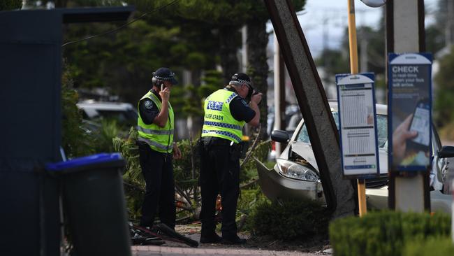 Police at the scene of the first fatal crash of 2021, where a cyclist died after colliding with a car at Henley Beach. Picture: Tricia Watkinson