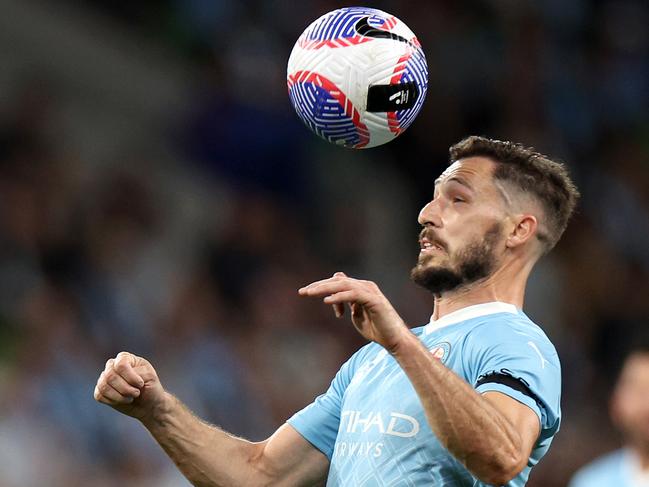 MELBOURNE, AUSTRALIA - MAY 05: Mathew Leckie of Melbourne City heads the ball during the A-League Men Elimination Final match between Melbourne Victory and Melbourne City at AAMI Park, on May 05, 2024, in Melbourne, Australia. (Photo by Jonathan DiMaggio/Getty Images)