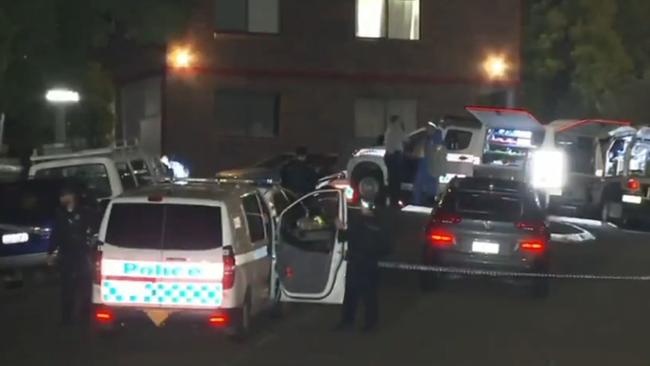 Police establish a crime scene in the Newmarket street. Picture: 9 News