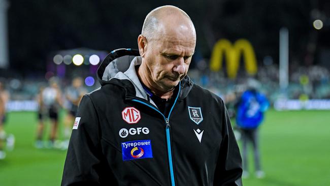 ADELAIDE, AUSTRALIA - APRIL 05:  Ken Hinkley, Senior Coach of the Power  leave the ground after winning   the round four AFL match between Port Adelaide Power and Essendon Bombers at Adelaide Oval, on April 05, 2024, in Adelaide, Australia. (Photo by Mark Brake/Getty Images)
