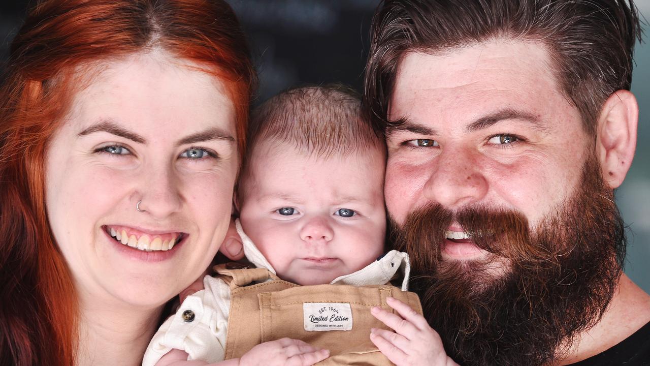 Gold Coast couple Amy and Marcus Nicholson with their young son Tommy after his bout with Sepsis.. Picture Glenn Hampson