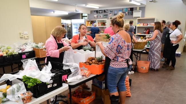 Volunteers help pack produce at the Hornsby Connect food service at the Hornsby Youth and Family Community Centre. Picture: Joel Carrett