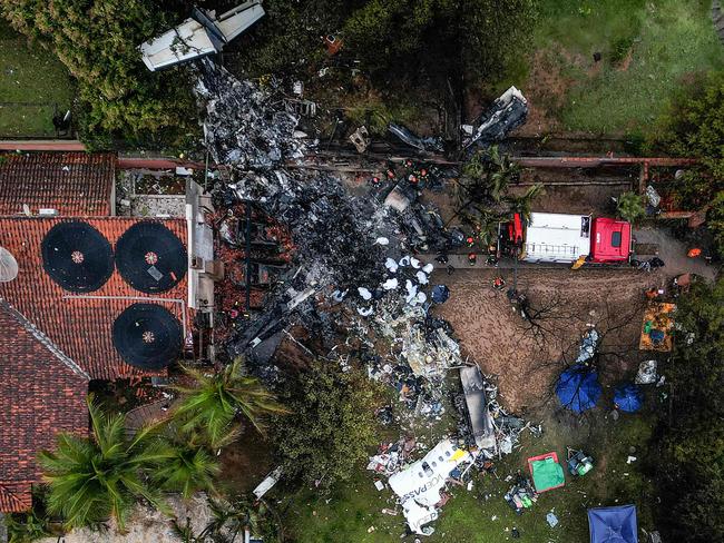 Aerial view of the wreckage of an aeroplane that crashed with 62 people on board in Vinhedo, Sao Paulo State, Brazil. Picture: AFP