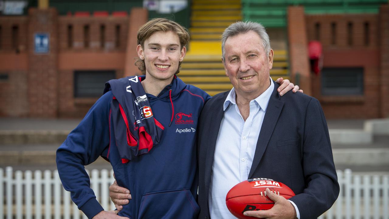 Max Michalanney with his dad, Norwood great, Jim. Picture: Emma Brasier