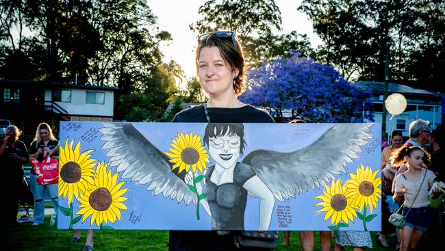 Artist Chloe Harrison with the painting she made in memory of Emily Thompson. Picture: Richard Walker