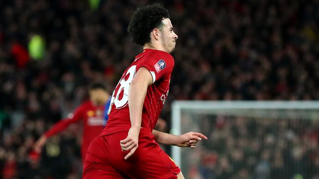 Curtis Jones celebrates after scoring for Liverpool against Everton at Anfield. Picture: Getty Images