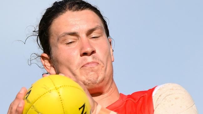 GOLD COAST, AUSTRALIA - FEBRUARY 23: Tom Berry of the Suns marks during the AFL match simulation between Gold Coast Suns and Essendon Bombers at Austworld Centre Oval on February 23, 2023 in Gold Coast, Australia. (Photo by Matt Roberts/Getty Images)