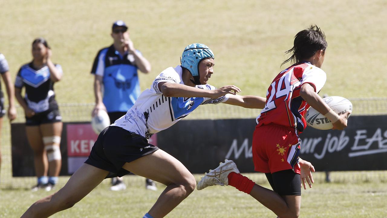 Hunter Manua from Fiji and Rizal Peters from Philippines. Under 16 boys Philippines v Fiji. Harmony Nines Rugby League. Picture: John Appleyard