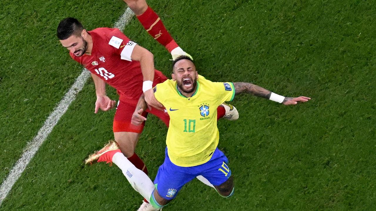 Brazil's forward Neymar gestures after being fouled during the Qatar 2022 World Cup Group G football match between Brazil and Serbia.