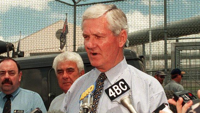 Police Minister Russell Cooper outside the jail.