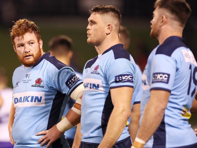 WOLLONGONG, AUSTRALIA - MARCH 06: Harry Johnson-Holmes of the Waratahs and his team look dejected after a Chiefs try during the round six Super Rugby match between the Waratahs and the Chiefs at WIN Stadium on March 06, 2020 in Wollongong, Australia. (Photo by Mark Kolbe/Getty Images)