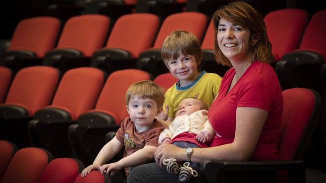 Dr Julia Shore has just graduated with a PhD in mathematics with her children Christopher 2, Benjamin 4 and Amberlynn 7weeks at the UTAS Sir Stanley Burbury Theatre.  Picture: Chris Kidd